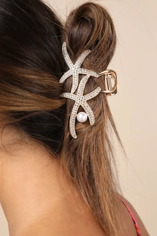 Shelley Gold Rhinestone Starfish Claw Hair Clip sold by Lulus