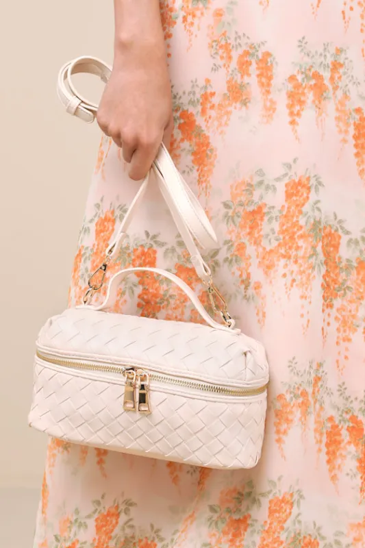 Elandra Ivory Woven Pouch Bag made by Lulus