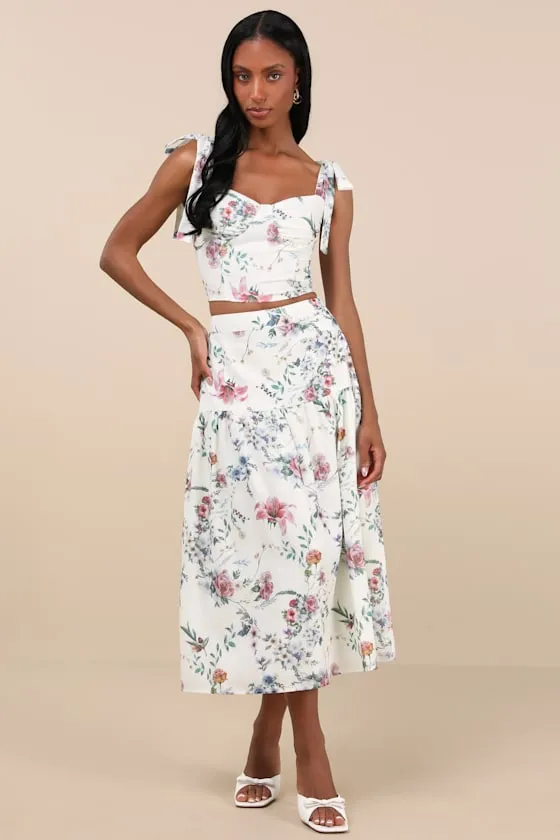 Beautifully Chic White Floral Drop Waist Midi Skirt sold by Lulus