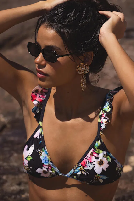 Varela Black Multi Floral Ruffled Bikini Top sold by Lulus