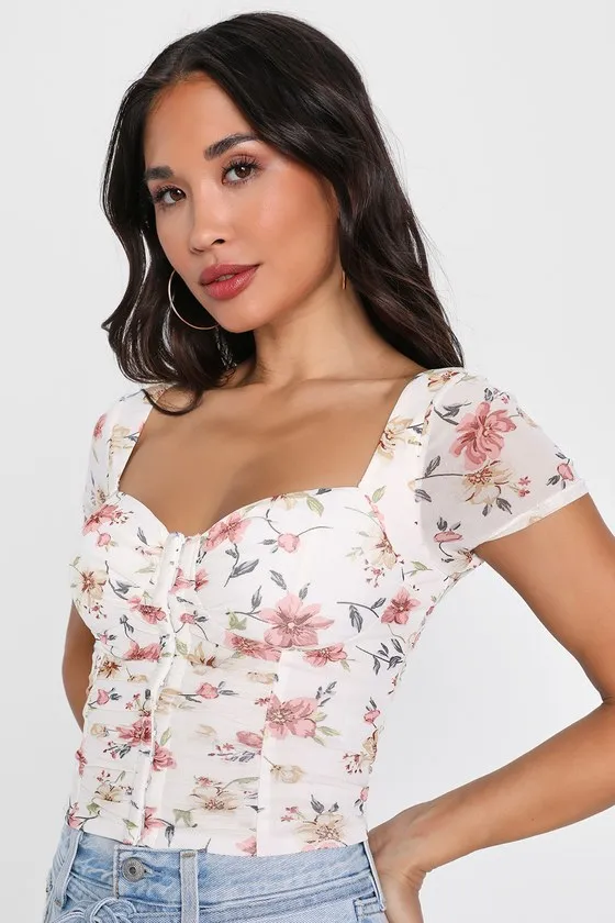 Sweeter Vibes Ivory Floral Mesh Short Sleeve Bustier Crop Top sold by Lulus