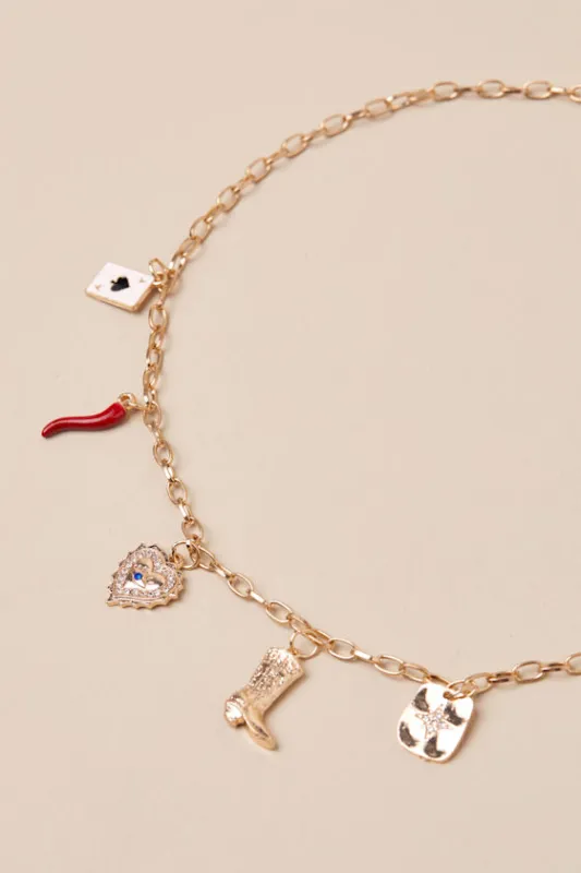 Pristine Addition Gold Rhinestone Charm Necklace sold by Lulus