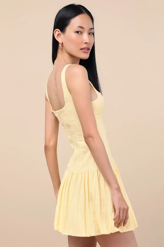 Khamari Yellow Textured Drop Waist Bubble-Hem Mini Dress sold by Lulus product image thumbnail 2