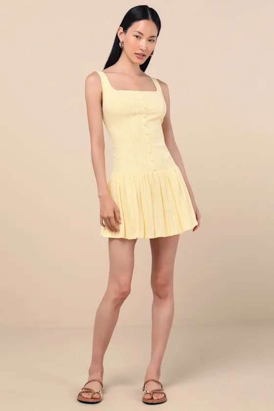 Khamari Yellow Textured Drop Waist Bubble-Hem Mini Dress sold by Lulus product image thumbnail 3