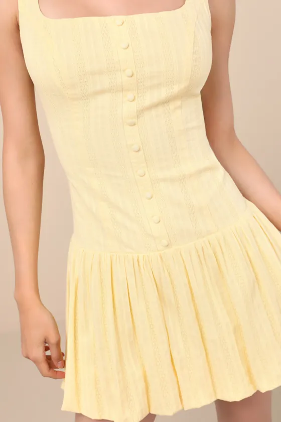 Khamari Yellow Textured Drop Waist Bubble-Hem Mini Dress sold by Lulus product image thumbnail 4