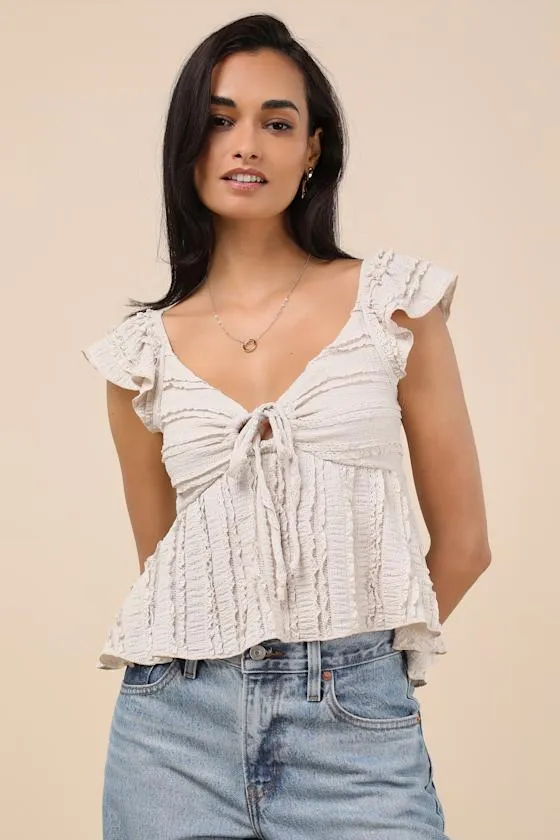 Maley Beige Textured Peplum Top sold by Lulus