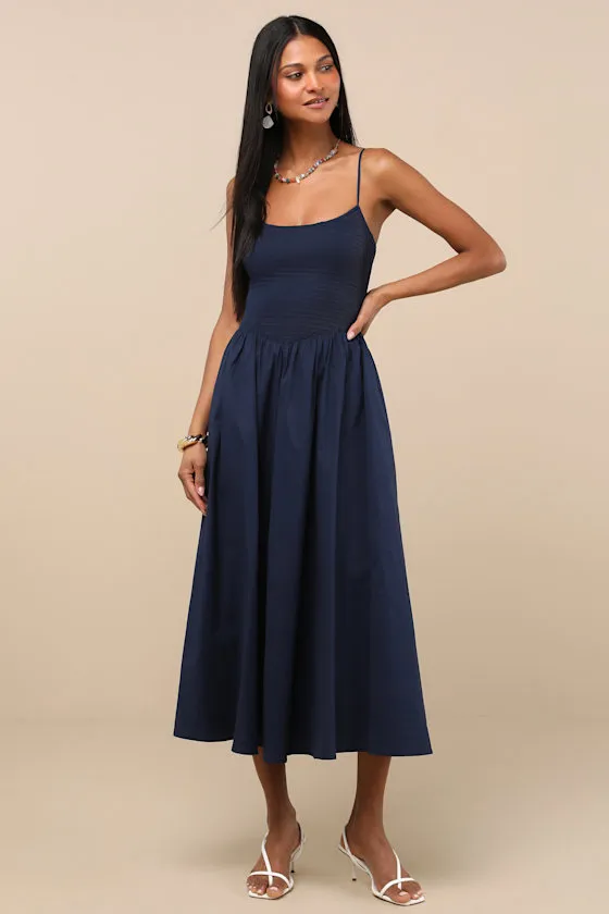 Tandria Navy Smocked Sleeveless Midi Dress sold by Lulus