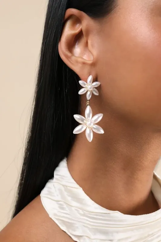 Chloris White Pearl Flower Drop Earrings sold by Lulus