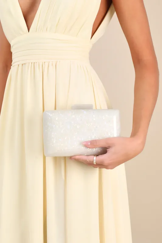 Masie Ivory Iridescent Hardcase Clutch sold by Lulus