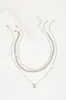 Three-Way Tie Silver Necklace Set sold by Lulus