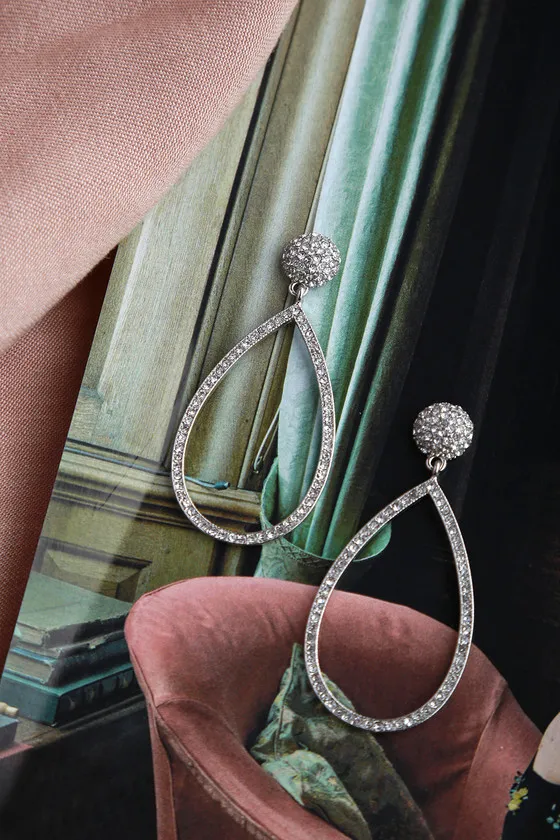 Glow For You Silver Teardrop Rhinestone Earrings sold by Lulus