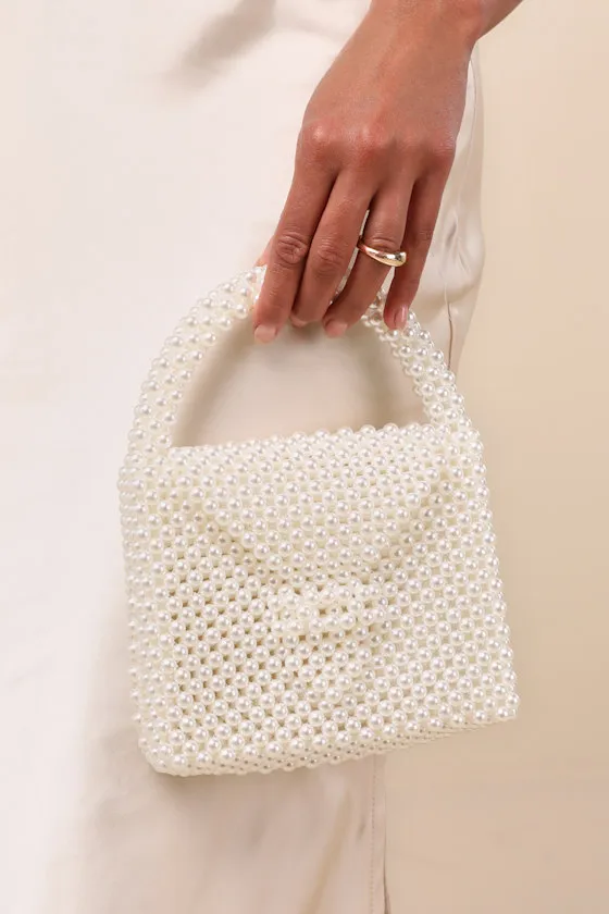 Damona Ivory Pearl Handle Bag sold by Lulus