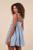 Charmed Aura Light Wash Denim Tie-Strap Bubble-Hem Mini Dress sold by Lulus