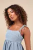 Charmed Aura Light Wash Denim Tie-Strap Bubble-Hem Mini Dress sold by Lulus