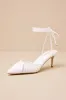 Ansel White Snake-Embossed Lace-Up Pumps sold by Lulus
