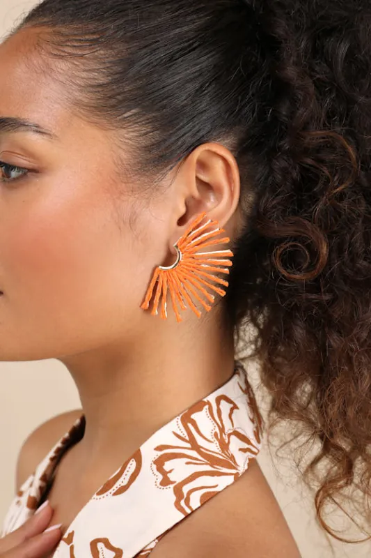 Ravi Orange Raffia Sunburst Earrings sold by Lulus