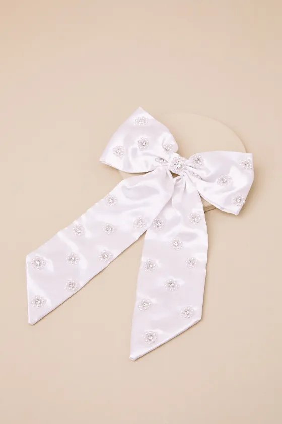 Cynthia White Satin Pearl Bow Hair Clip sold by Lulus
