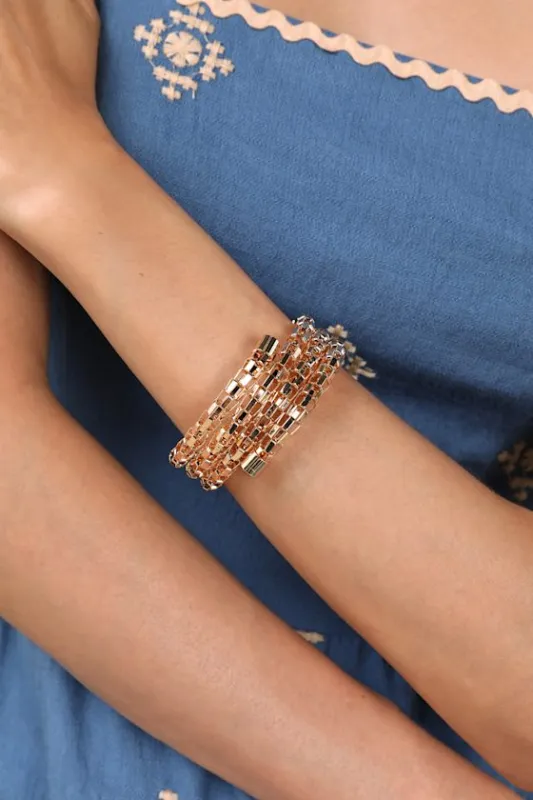 Yuna Gold Chain Link Coil Cuff Bracelet sold by Lulus