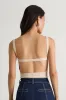 Emberlin Beige Ribbed Low-Back Sleeveless Bodysuit sold by Lulus