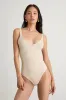 Emberlin Beige Ribbed Low-Back Sleeveless Bodysuit sold by Lulus