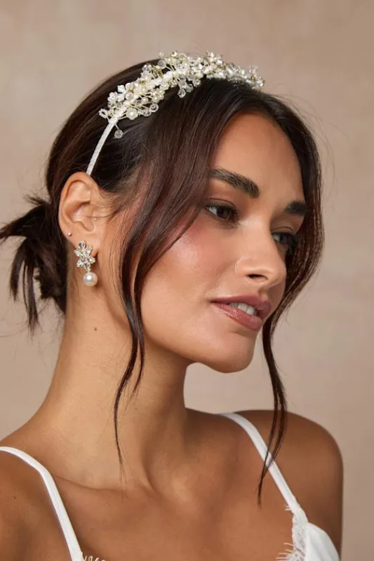 Elfrida White Pearl Beaded Flower Headband sold by Lulus