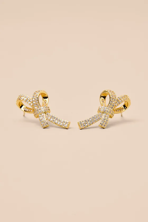 Lucetta 14KT Gold Rhinestone Bow Stud Earrings sold by Lulus