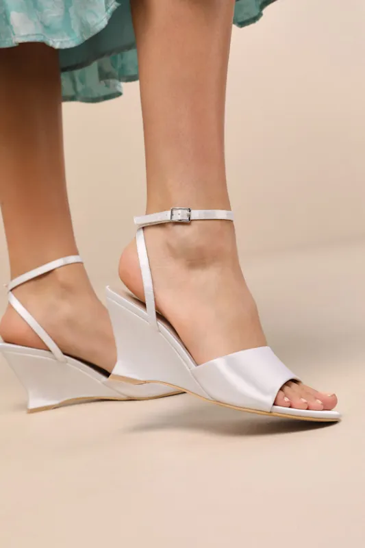 Chiarina White Satin Ankle Strap Wedge Sandals sold by Lulus