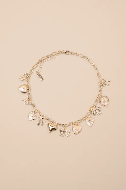 Harita Gold Heart and Bow Charm Necklace sold by Lulus