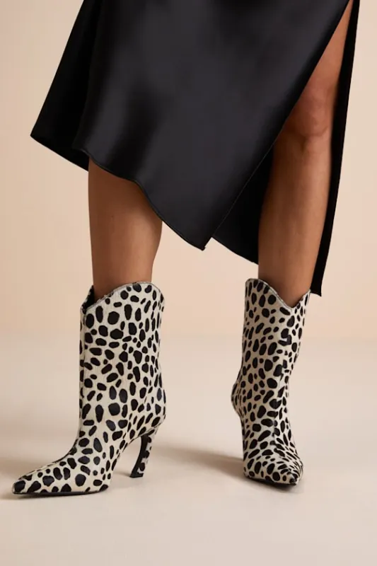 Maryann Curve White Calf Hair Booties sold by Lulus