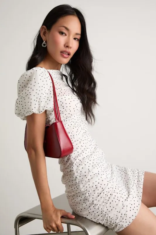 Claritza White Polka Dot Ruched Puff Sleeve Mini Dress sold by Lulus