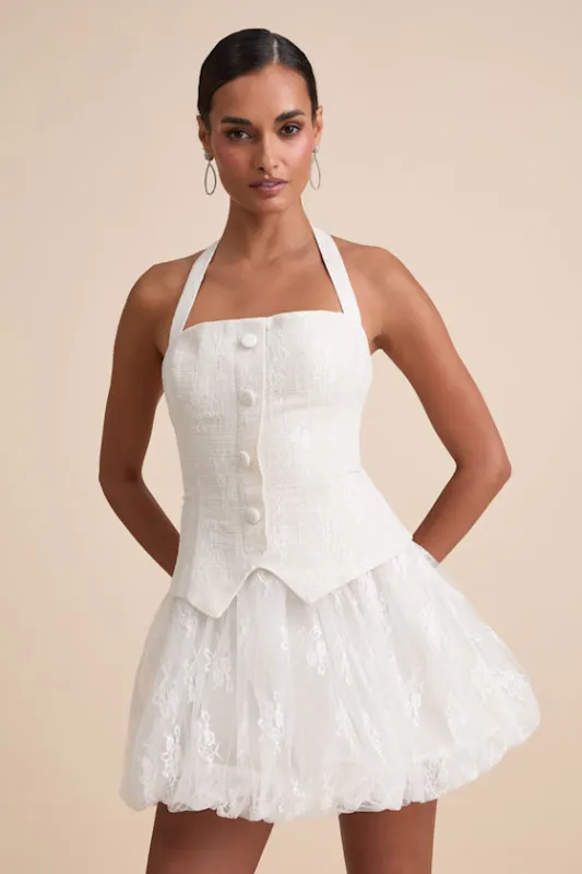 Ottoline Ivory Mixed-Media Bubble-Hem Halter Mini Dress sold by Lulus