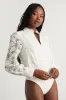 Mirabie Ivory Lace Button-Front Long Sleeve Bodysuit sold by Lulus