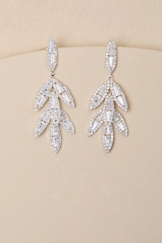 Varna Silver Rhinestone Leaf Earrings sold by Lulus