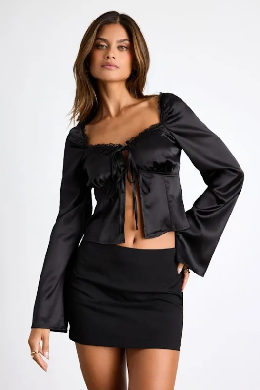 Bess Black Satin Tie-Front Long Sleeve Top sold by Lulus