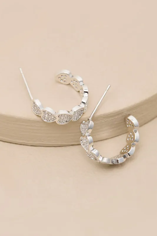 Meriella 14KT White Gold Stacked Heart Hoop Earrings sold by Lulus
