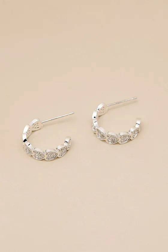 Meriella 14KT White Gold Stacked Heart Hoop Earrings sold by Lulus product image thumbnail 3