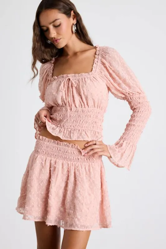 Katima Blush Pink Swiss Dot Smocked Mini Skirt sold by Lulus