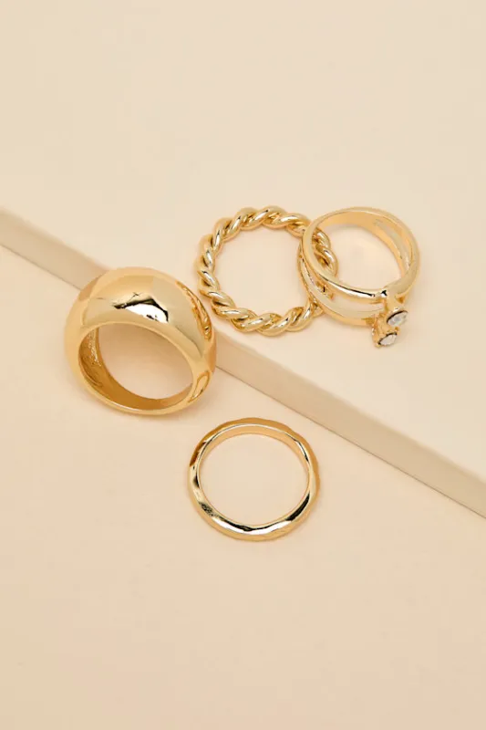 Elspeth Gold Rhinestone Four-Piece Ring Set sold by Lulus
