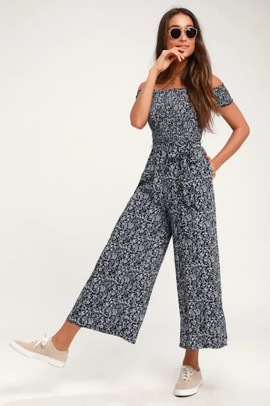 Behold Navy Blue Floral Print Off-the-Shoulder Jumpsuit sold by Lulus