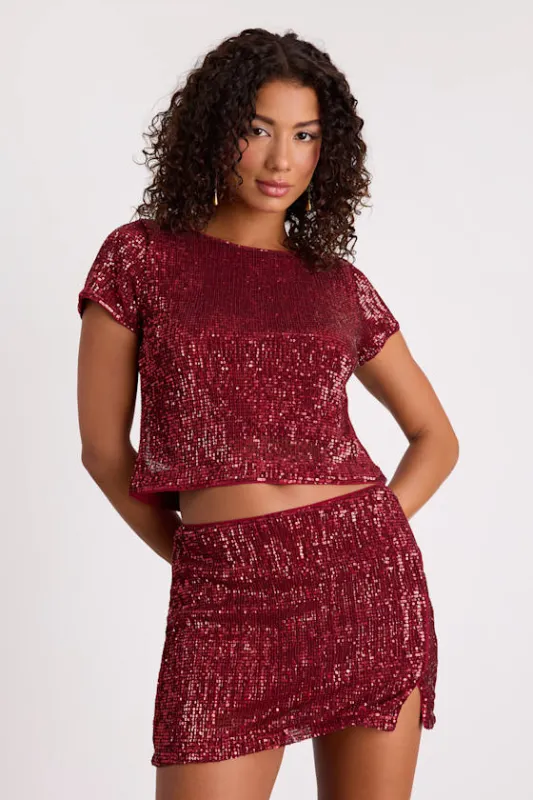 Isotta Burgundy Sequin Low-Rise Mini Skirt sold by Lulus