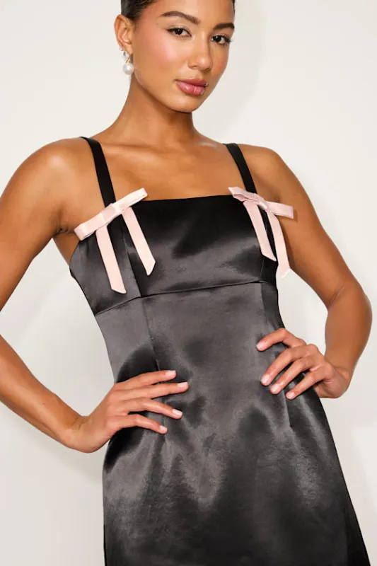 Yesemia Black Satin Bow Skater Mini Dress sold by Lulus