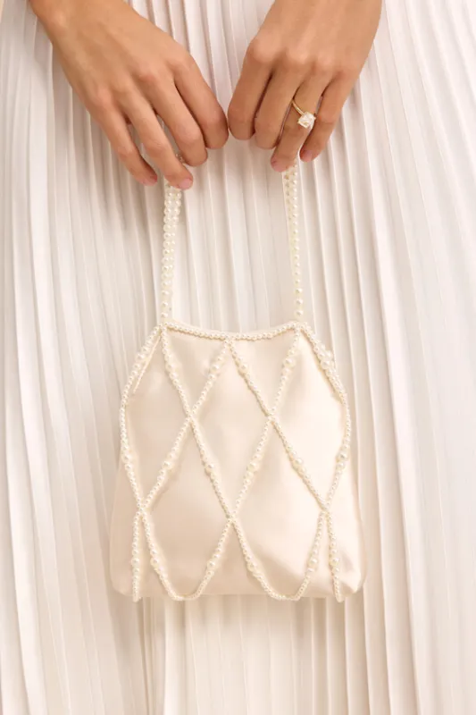 Gloria Ivory Satin Pearl Pouch Handbag sold by Lulus