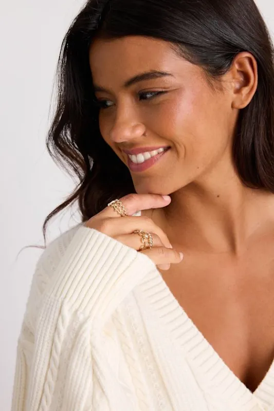 Daison Gold Rhinestone Four-Piece Ring Set sold by Lulus