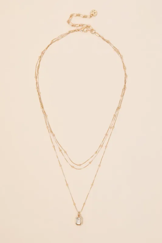 Mony Gold Beaded Pendant Layered Necklace sold by Lulus