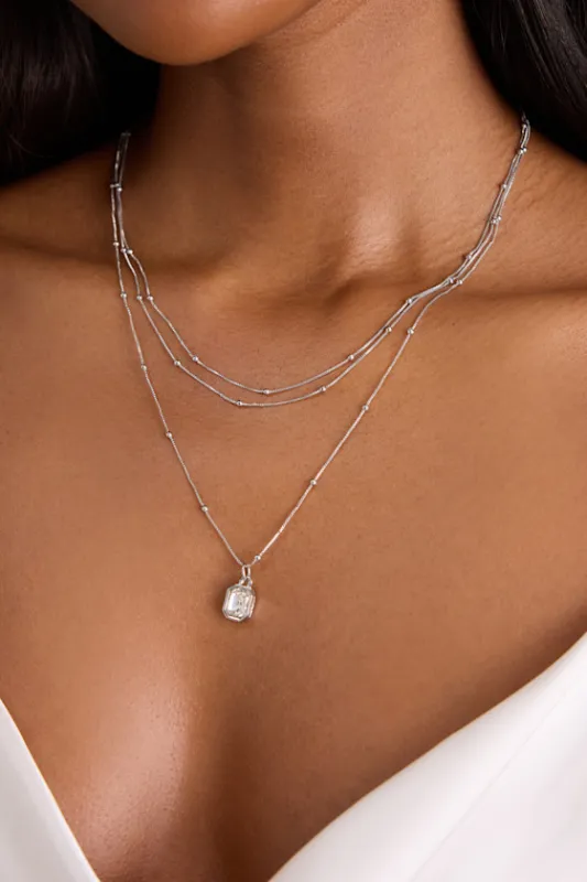 Mony Silver Beaded Pendant Layered Necklace sold by Lulus