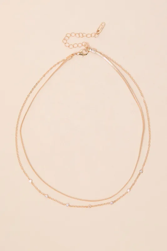 Maggie Gold Rhinestone Layered Necklace sold by Lulus