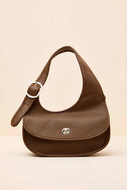 Banks Brown Pebbled Vegan Leather Crescent Bag sold by Lulus