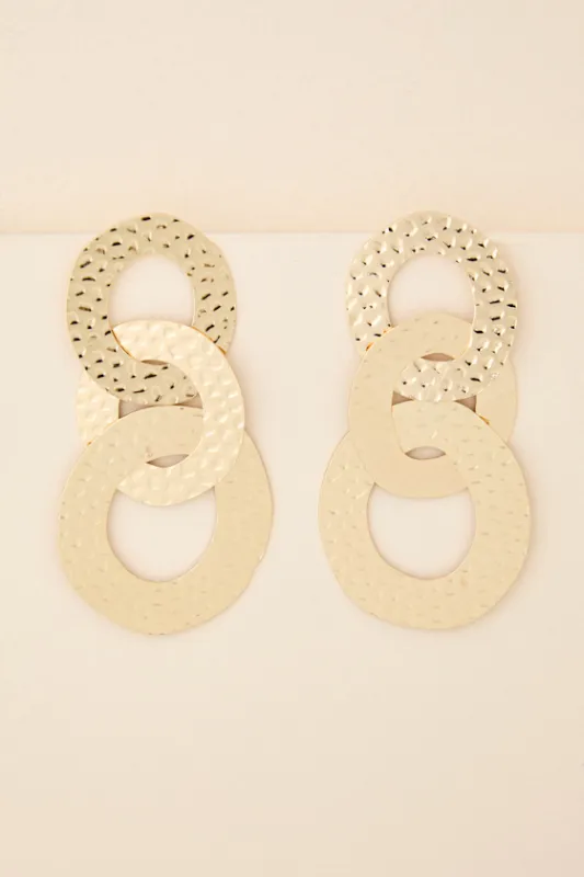 Jila Gold Hammered Linked Statement Earrings sold by Lulus