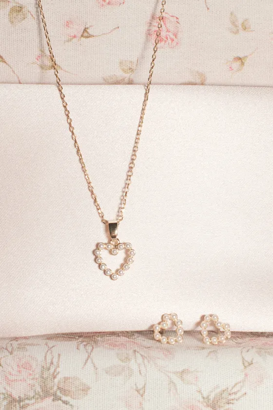 Caris 14KT Gold Pearl Heart Charm Necklace and Earring Set sold by Lulus