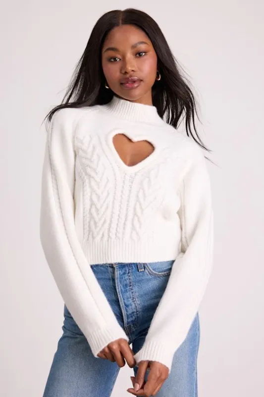 Priya Ivory Cutout Mock Neck Cropped Sweater sold by Lulus